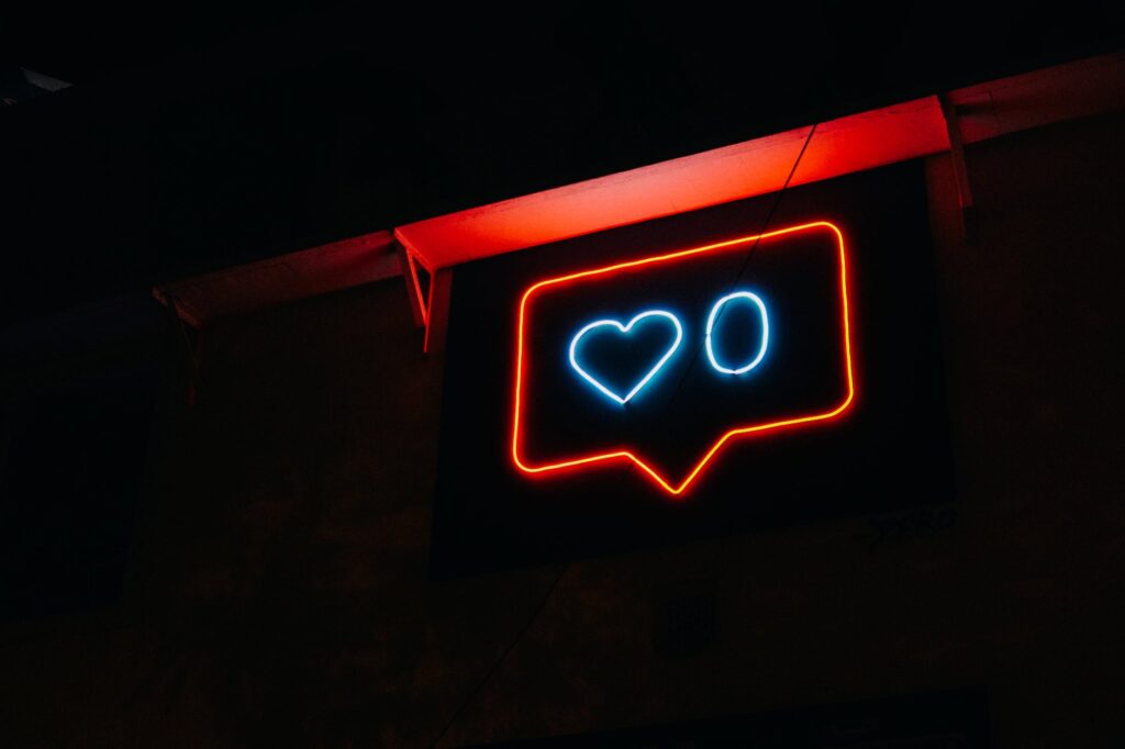 heart and zero neon light signage. Does the internet make us more disconnected?