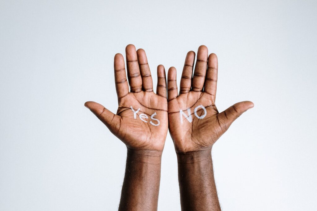 photo of person s hand with words. How to say no