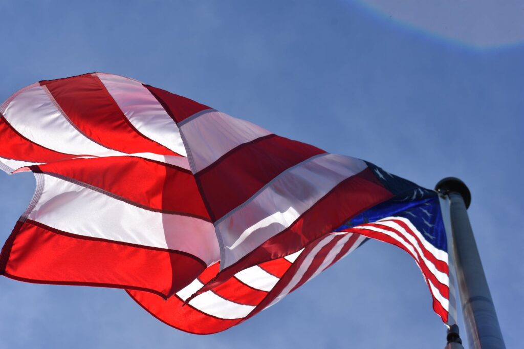 low angle photography of american flag. July 4th books