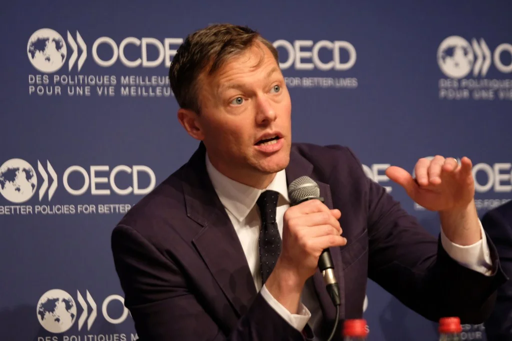 Matthew Desmond's Poverty By America. He is seen here during a 2018 conference at the OECD Forum