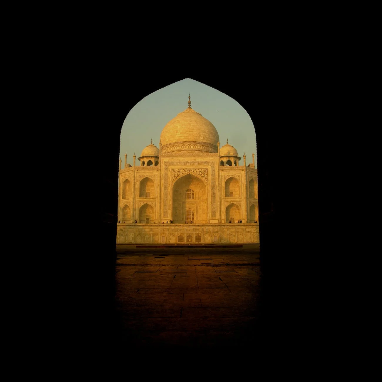 taj mahal through an arch, India history Mughal books banned